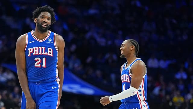 Joel Embiid and Tyrese Maxey in 76ers uniforms ahead of the season opener