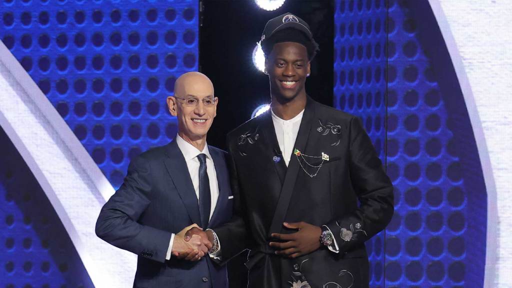 AJ Dybantsa shakes hands with NBA commissioner Adam Silver on draft night