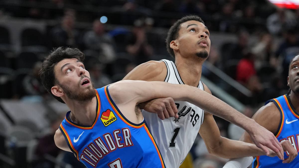 File photo: Chet Holmgren and Victor Wembanyama during a previous Thunder-Spurs matchup — the duel that decides Tuesday night.