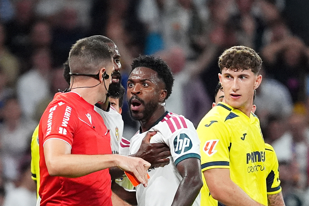 Vinícius Júnior is held back after being shown a red card in Real Madrid's LaLiga match against Villarreal