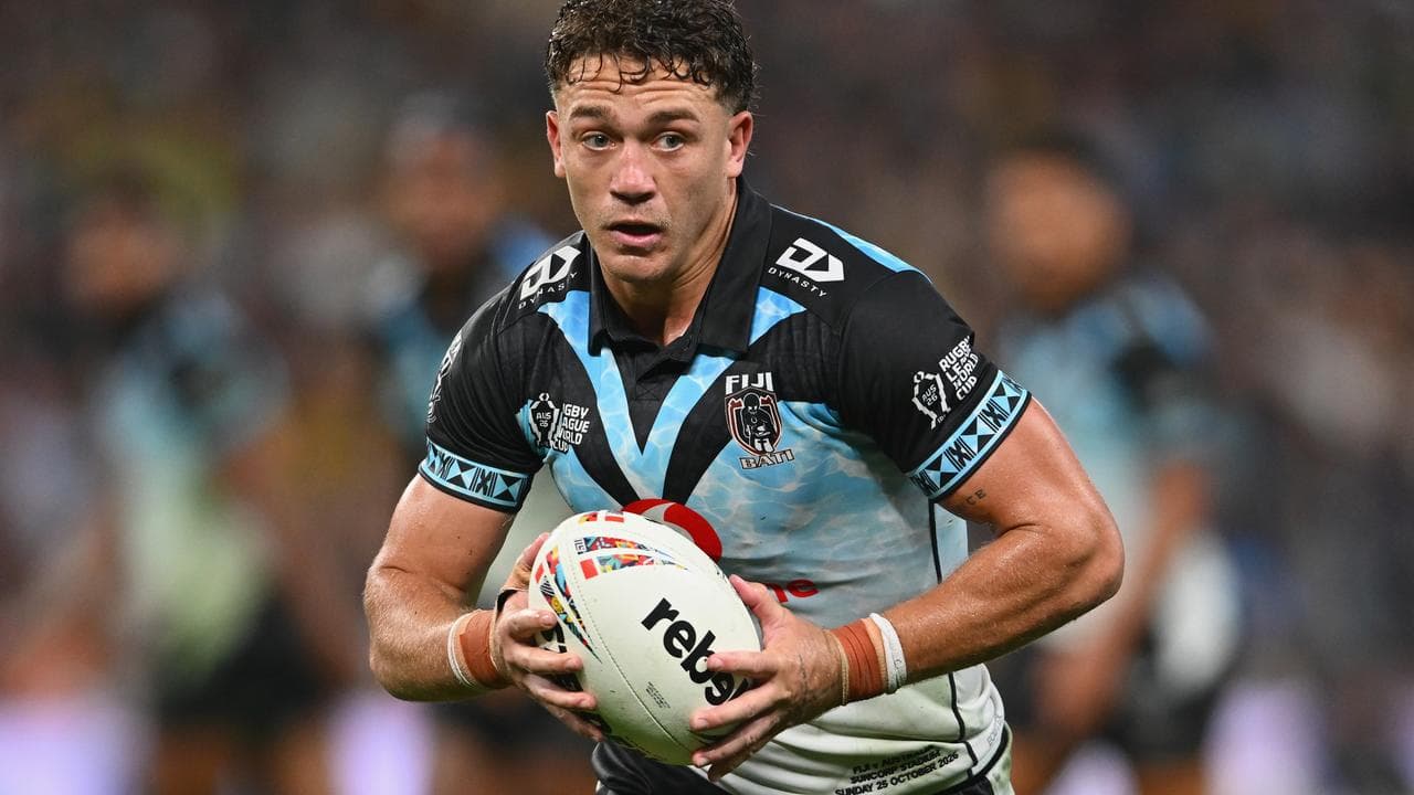 Fiji's Kurt Donoghoe creating an attacking chance against Australia