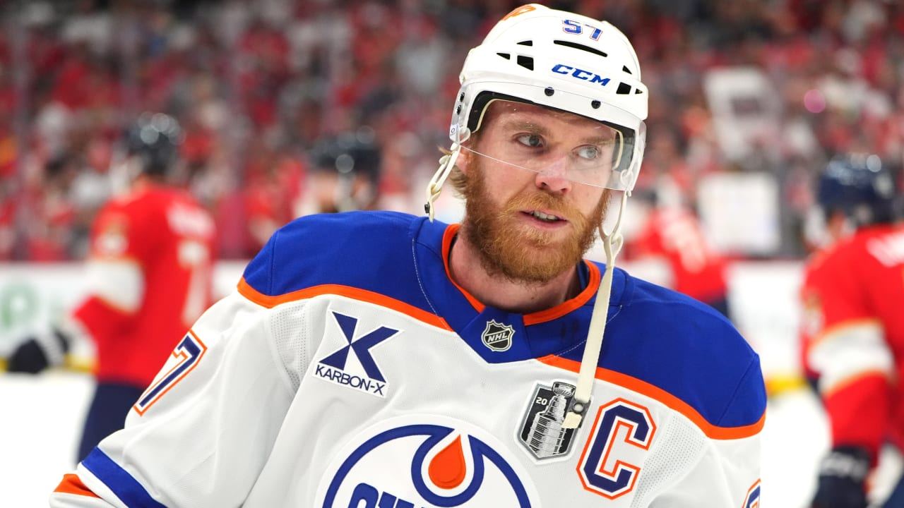 Oilers captain Connor McDavid on the ice in Edmonton's white road jersey