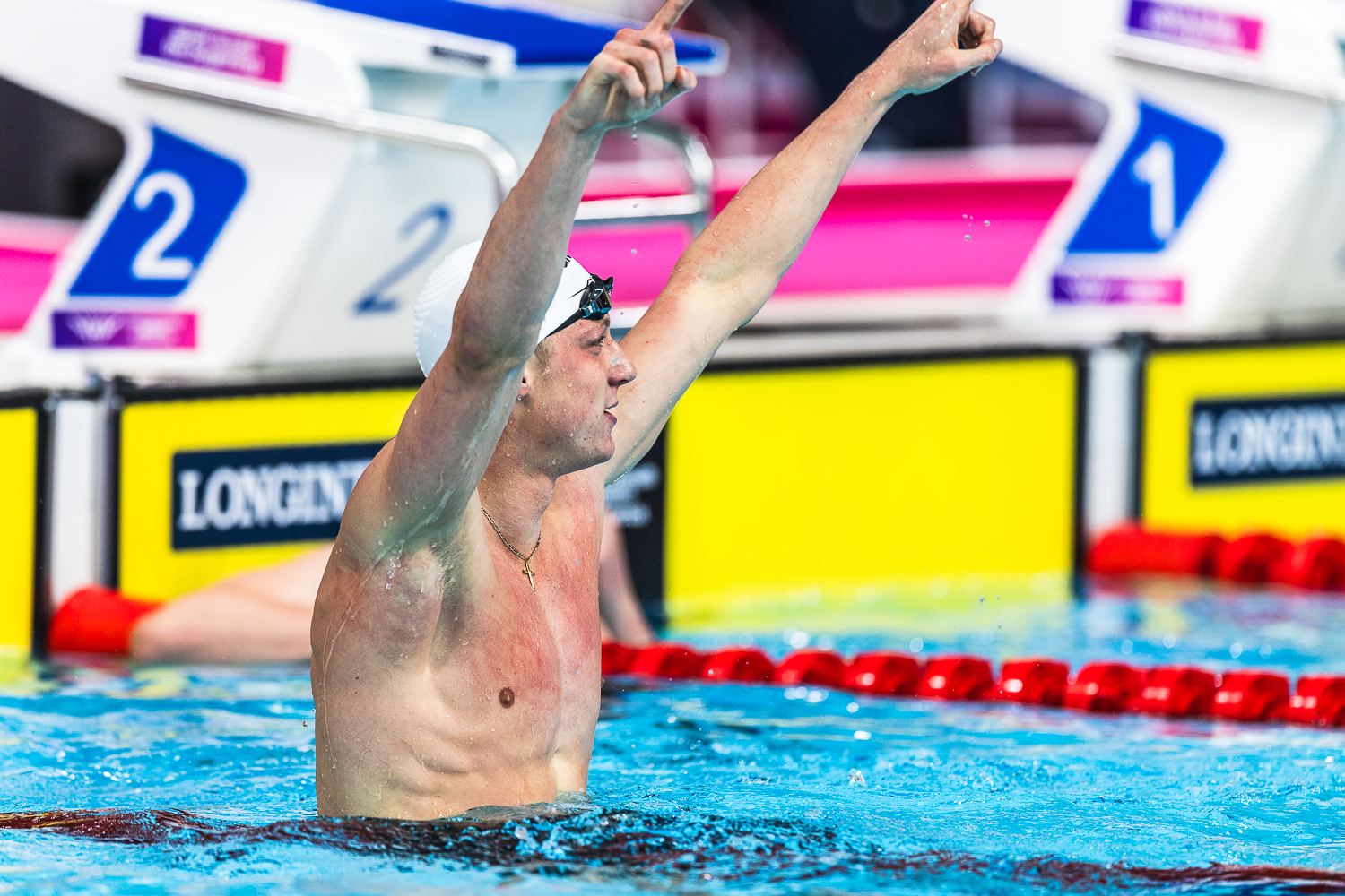 File photo: Pieter Coetze celebrates in the pool after a backstroke race.