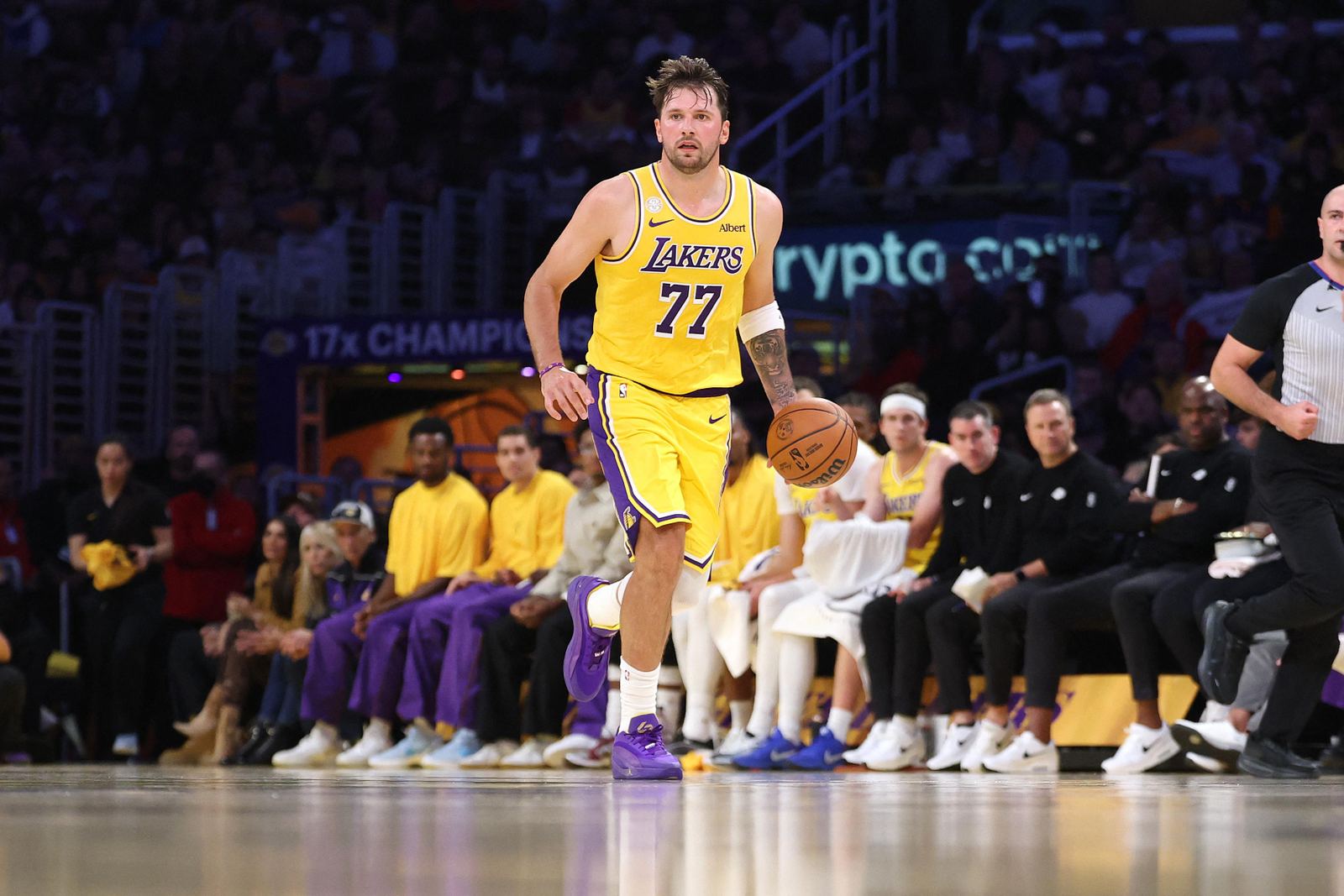Luka Doncic dribbles up the floor for the Los Angeles Lakers against the Golden State Warriors at Crypto.com Arena on Oct. 21, 2026.
