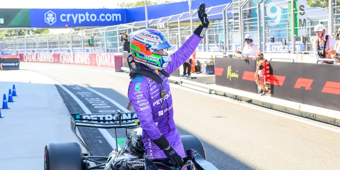 Kimi Antonelli waves to the crowd after a Mercedes Formula 1 outing