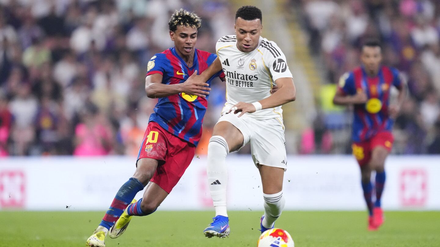 Lamine Yamal and Kylian Mbappé duel during the Spanish Super Cup final between Barcelona and Real Madrid in January 2026