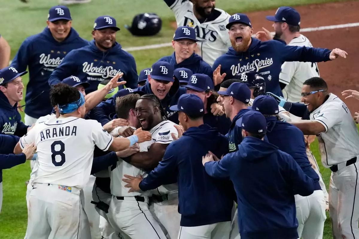 The Tampa Bay Rays celebrate their win after the 12th inning of World Series Game 4 against the Milwaukee Brewers at Tropicana Field on 27 October 2026.