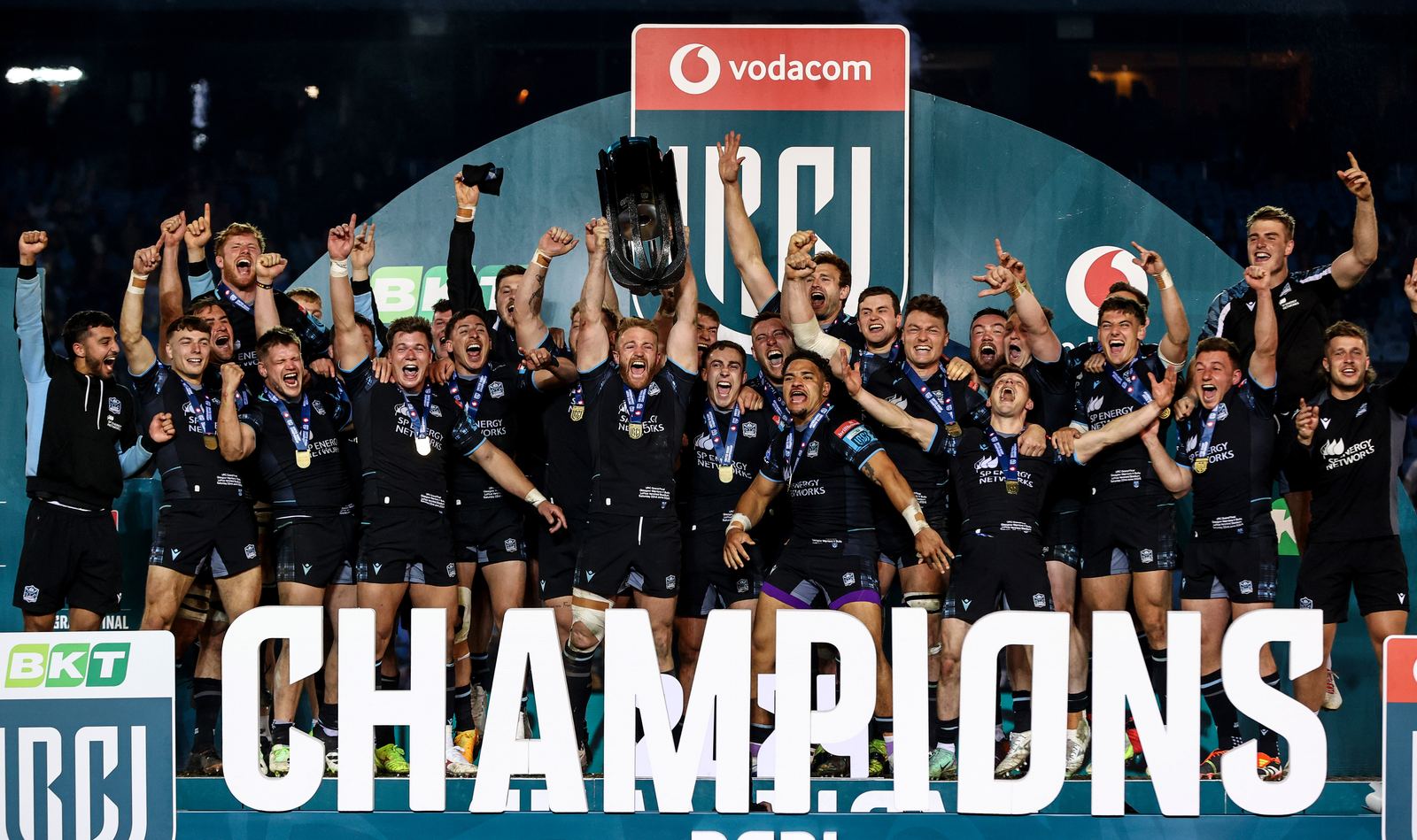 Archive photo: Glasgow Warriors celebrating with the URC trophy, not the 30 October 2026 match against the Lions.
