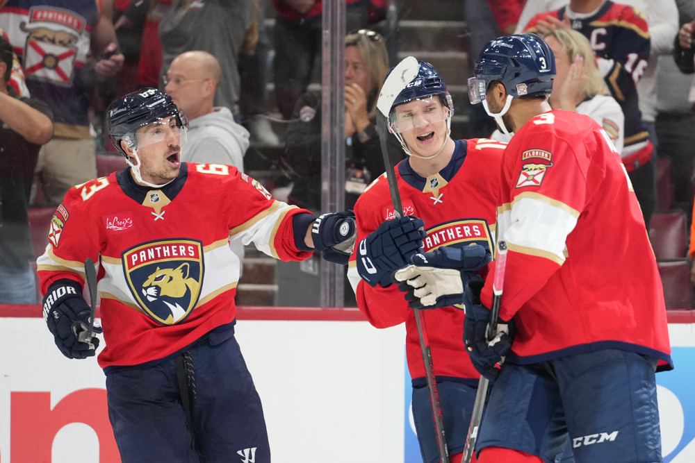 Archive photo: Seth Jones celebrates a goal with Anton Lundell and Brad Marchand (file photo, not the 30 October 2026 game against Winnipeg).
